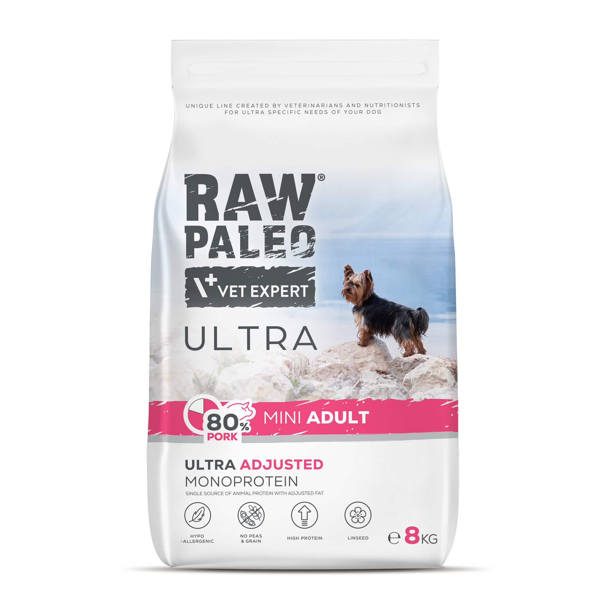 Opakowanie suchej karmy dla psów z napisem \'RAW PALEO VET EXPERT ULTRA\' oraz zdjęciem psa na tle krajobrazu. Na opakowaniu widnieje informacja \'80% PORK MINI ADULT\' oraz \'ULTRA ADJUSTED MONOPROTEIN\'.
