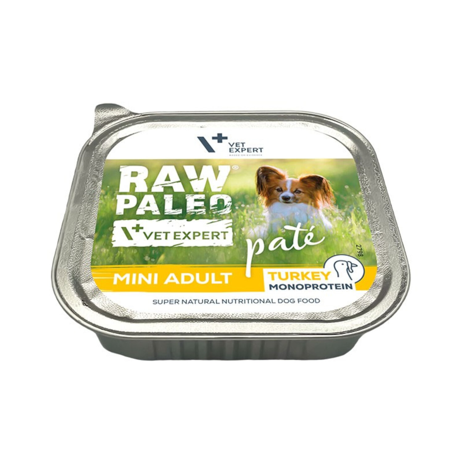 Opakowanie mokrej karmy dla psów z napisem \'RAW PALEO VET EXPERT pate MINI ADULT TURKEY MONOPROTEIN\'. Na etykiecie widoczny jest pies na tle zielonej trawy.