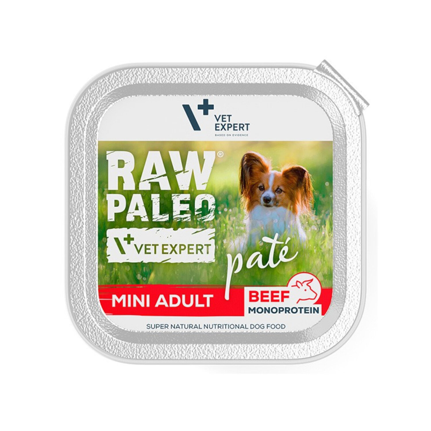 Opakowanie mokrej karmy dla psów z napisem \'RAW PALEO VET EXPERT paté MINI ADULT BEEF MONOPROTEIN\'. Na etykiecie widoczny jest pies na tle trawy oraz logo \'VET EXPERT\'.