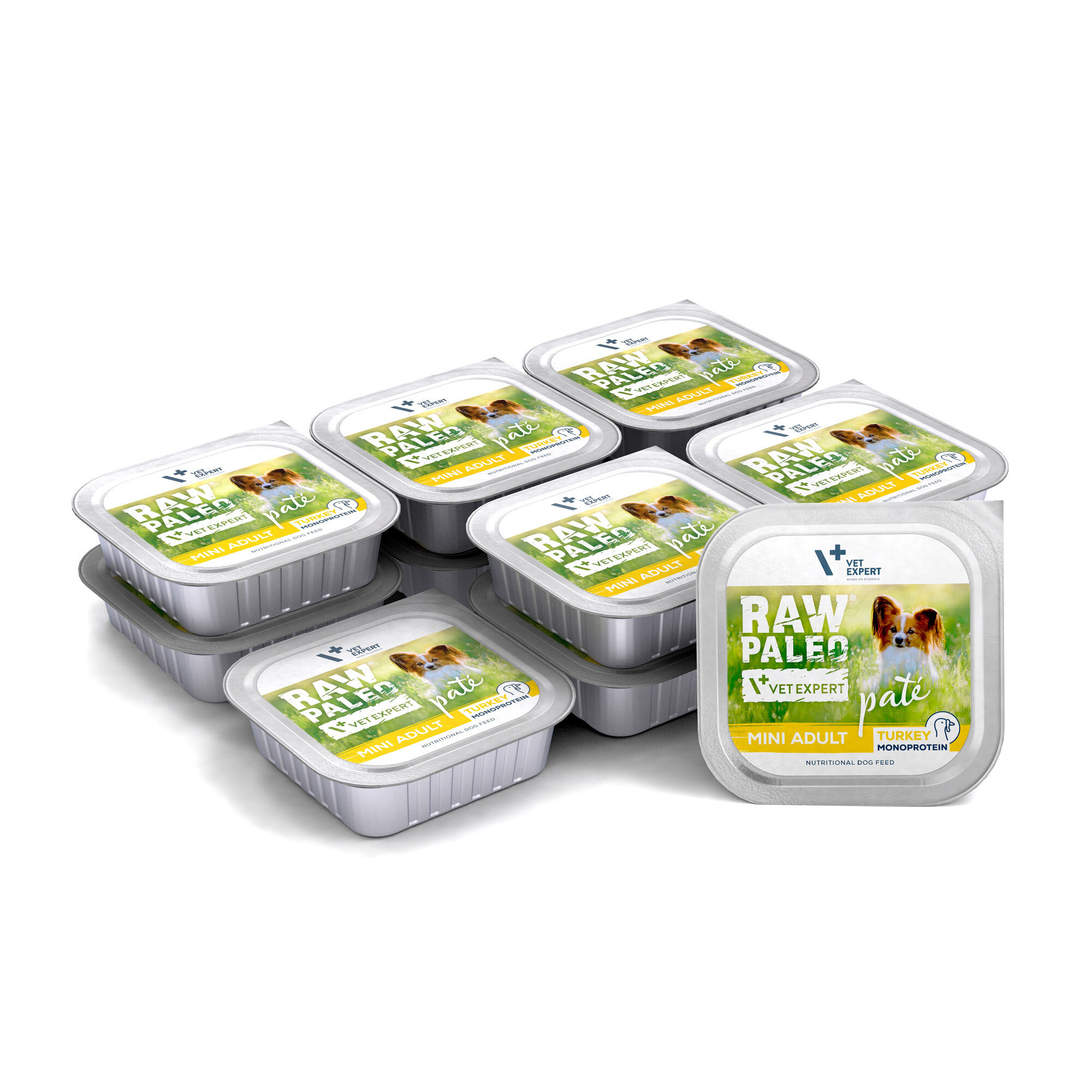 Na obrazie widoczne są opakowania mokrej karmy dla psów z etykietą \'RAW PALEO VETEXPERT pate MINI ADULT TURKEY MONOPROTEIN\'. Opakowania są ułożone w stos, a na etykiecie znajduje się zdjęcie psa.