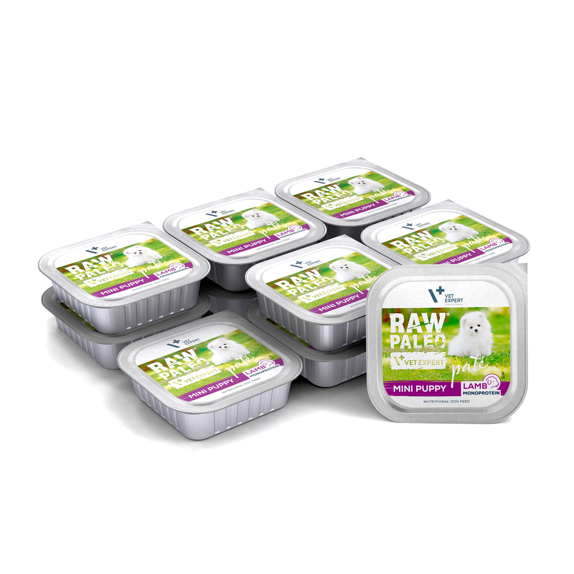 Na obrazie widoczne są opakowania mokrej karmy dla szczeniąt z napisem \'RAW PALEO MINI PUPPY LAMB MONOPROTEIN\'. Na etykiecie znajduje się zdjęcie białego szczeniaka na tle zielonej trawy.
