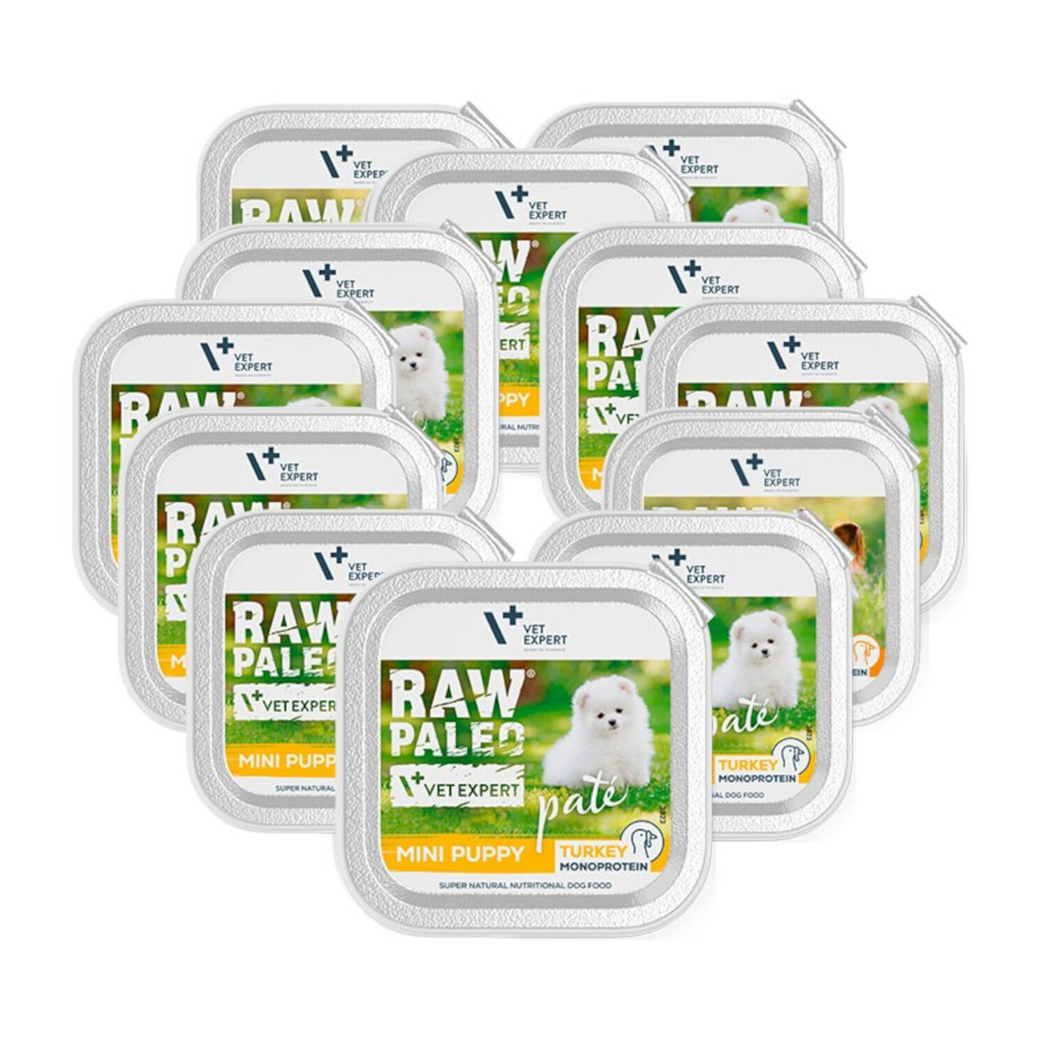 Na obrazie widoczne są opakowania mokrej karmy dla szczeniąt z napisem \'RAW PALEO VET EXPERT MINI PUPPY TURKEY MONOPROTEIN\'. Na etykiecie znajduje się zdjęcie białego szczeniaka na tle trawy.