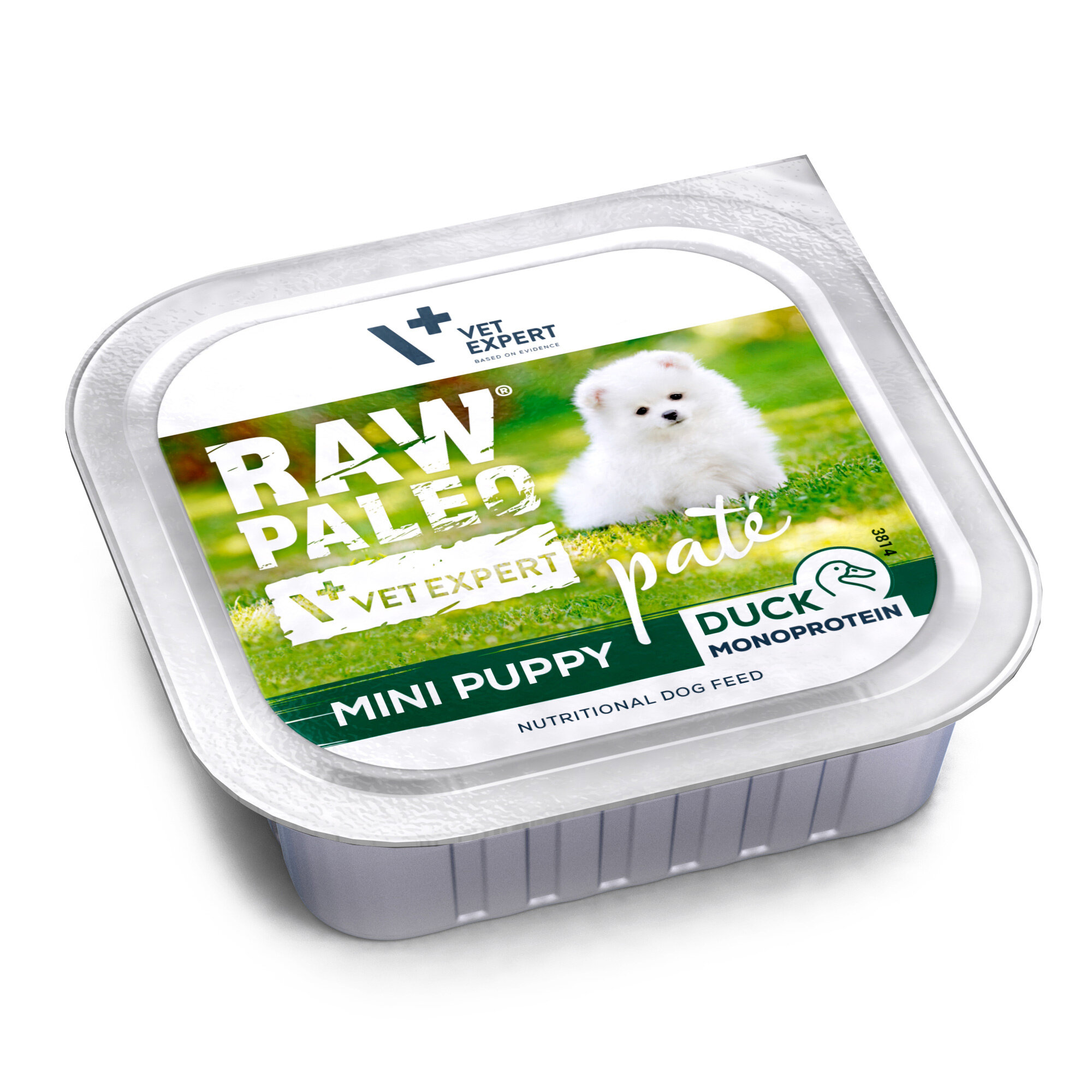 Opakowanie mokrej karmy dla szczeniąt z kaczką o nazwie \'RAW PALEO MINI PUPPY\'. Na etykiecie widoczny jest biały szczeniak na tle trawy oraz logo \'VET EXPERT\'.