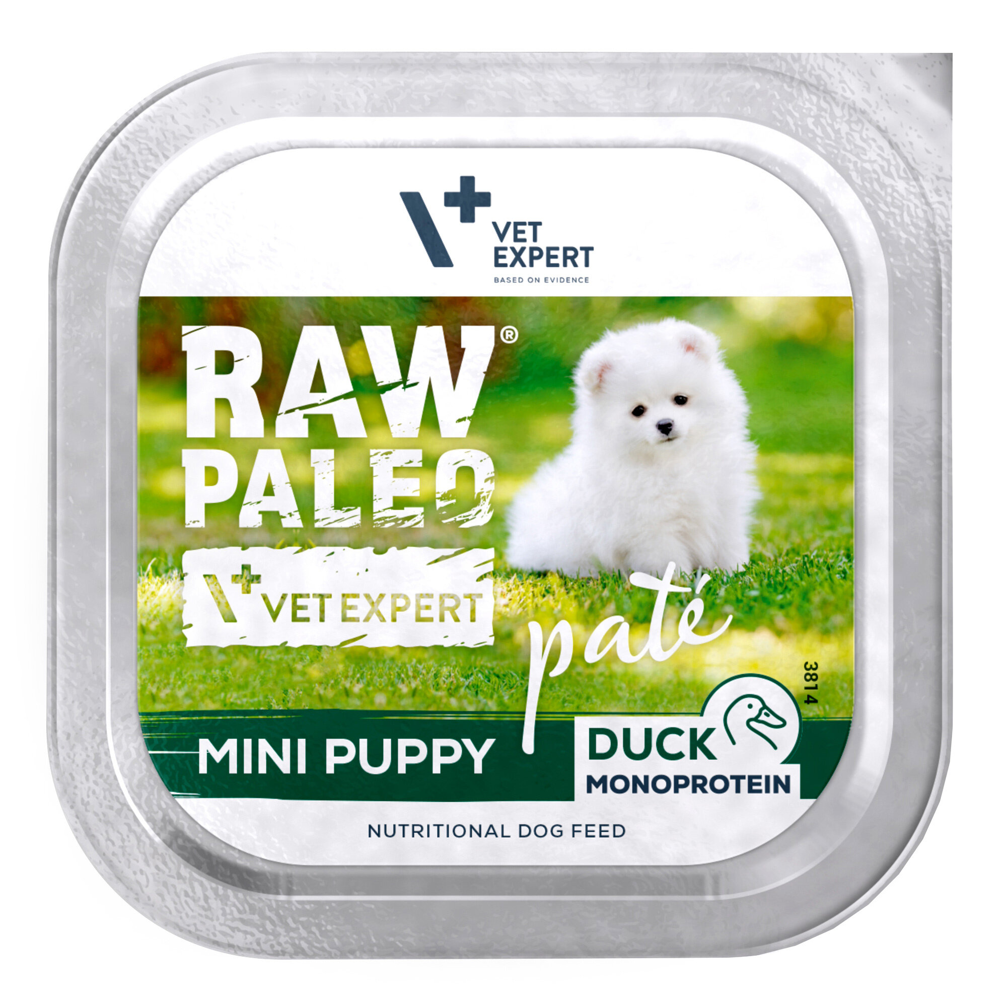 Opakowanie mokrej karmy dla szczeniąt z kaczką, z napisem \'RAW PALEO\', \'VET EXPERT\', \'MINI PUPPY\', \'DUCK MONOPROTEIN\'. Na etykiecie widoczny jest biały szczeniak na tle zielonej trawy.