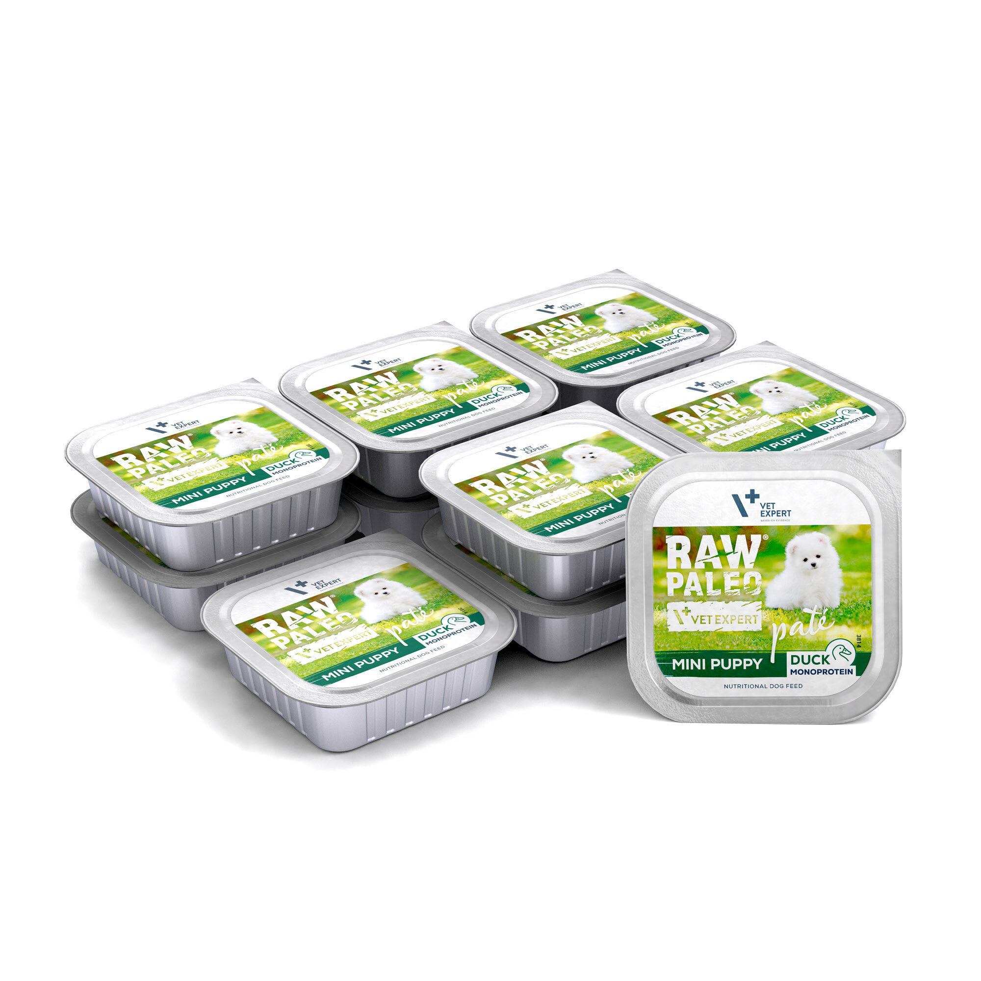 Na obrazie widoczne są opakowania mokrej karmy dla szczeniąt z etykietą \'RAW PALEO MINI PUPPY DUCK MONOPROTEIN\'. Na etykiecie znajduje się zdjęcie białego szczeniaka na tle zielonej trawy.