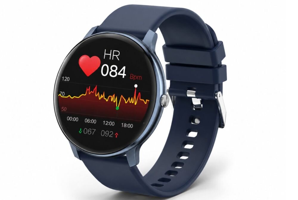Smartwatch z niebieskim paskiem wyświetla na ekranie pomiar tętna z wartością \'HR 084 Bpm\' oraz wykres aktywności serca. Na ekranie widoczne są również wartości \'067\' i \'092\'.