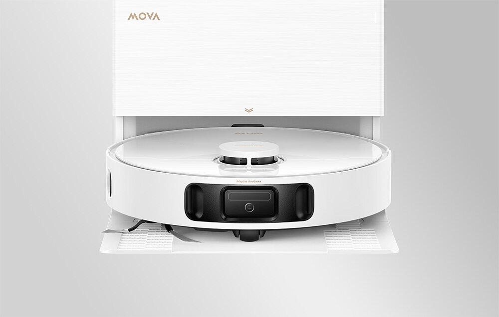 Na obrazie widoczny jest biały robot sprzątający z logo \'MOVA\' na górze. Robot znajduje się w stacji dokującej, a na jego przedniej części widoczny jest napis \'Auto-Empty\'.