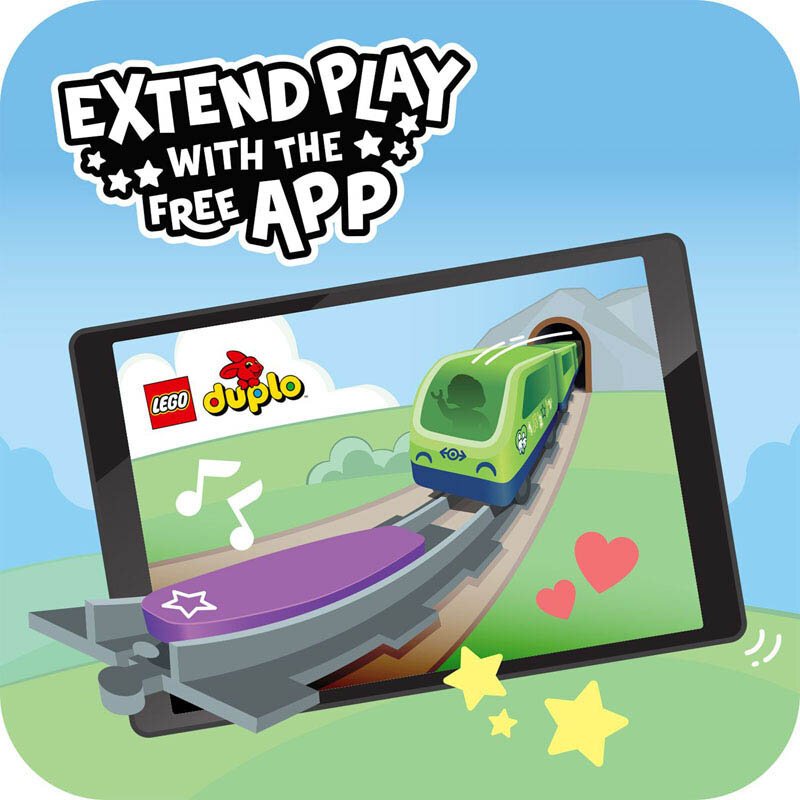 Obraz przedstawia tablet z wyświetlonym pociągiem LEGO DUPLO na torach, otoczony symbolami nut, serc i gwiazd. Na górze widnieje napis \'EXTEND PLAY WITH THE FREE APP\'.