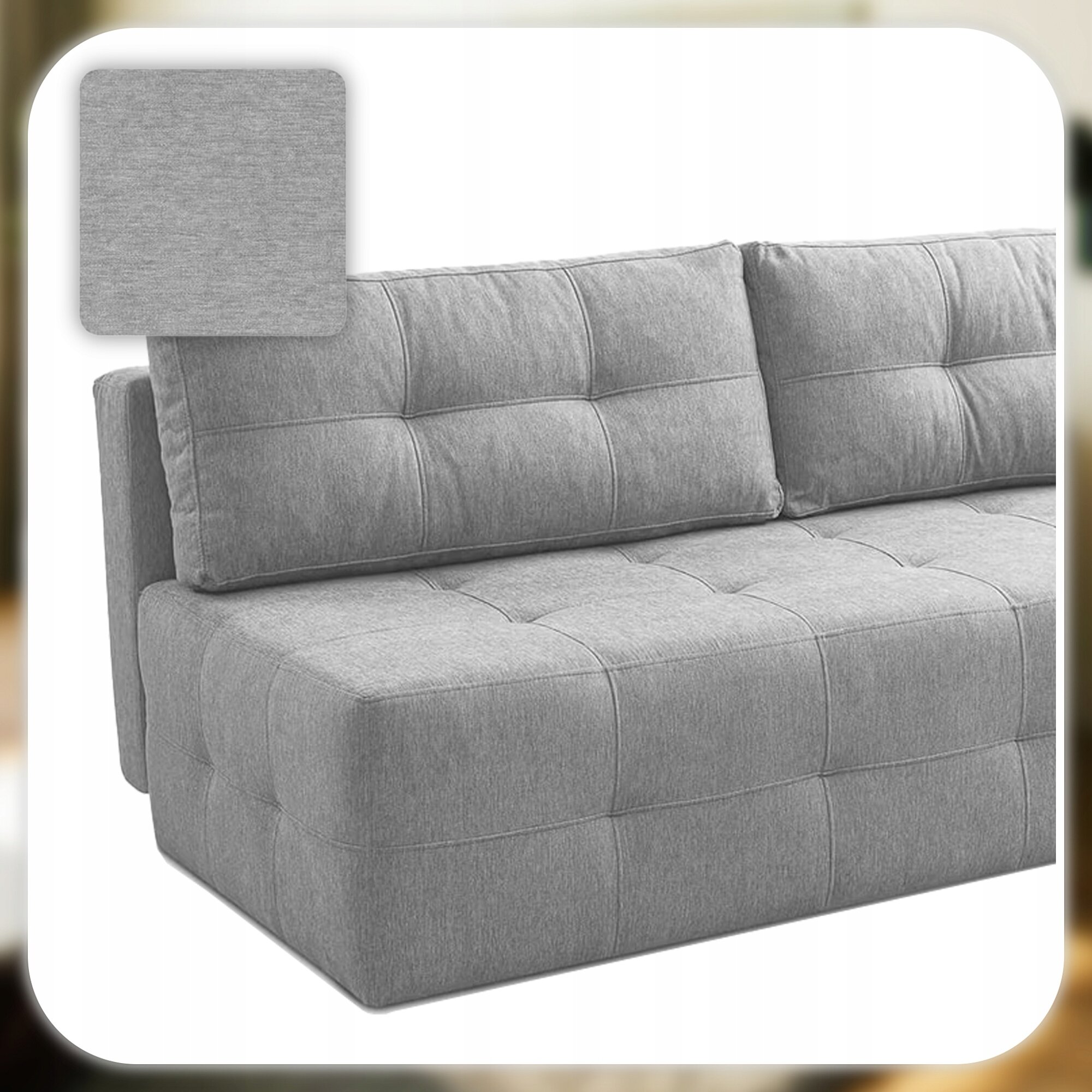 Szara sofa z funkcją spania, z widocznymi przeszyciami na poduszkach i siedzisku. W lewym górnym rogu znajduje się próbka materiału w tym samym kolorze.