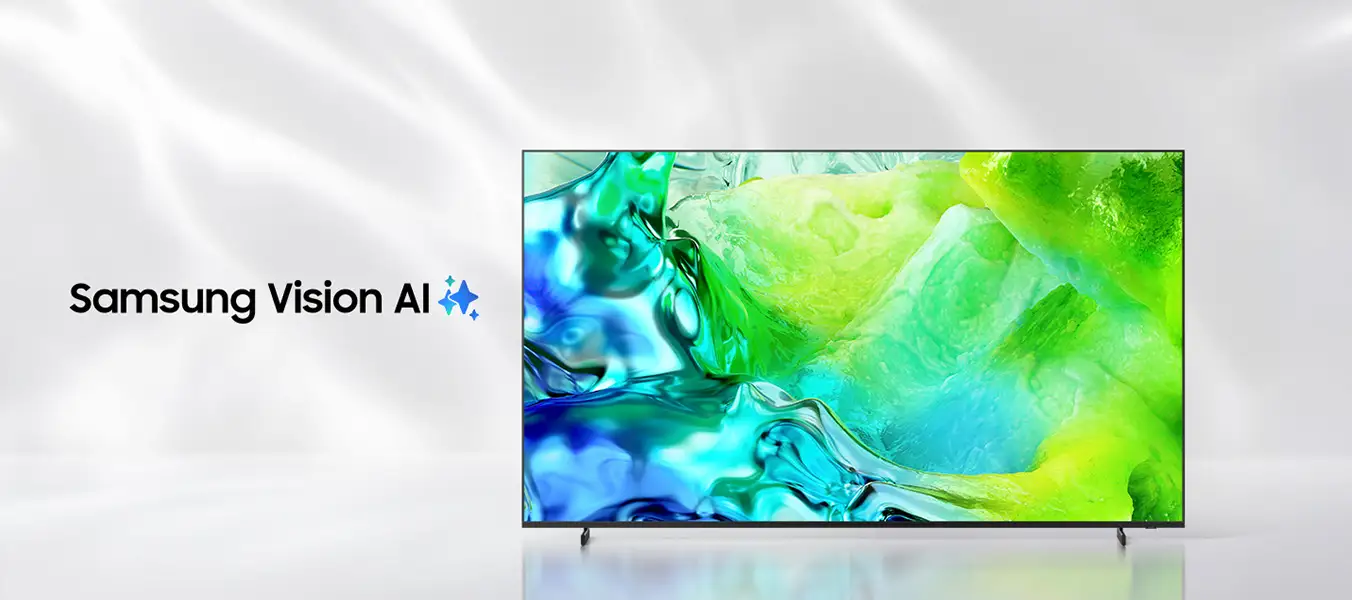 Obraz przedstawia telewizor z wyświetlanym kolorowym wzorem w odcieniach zieleni i niebieskiego. Obok znajduje się napis \'Samsung Vision AI\'.