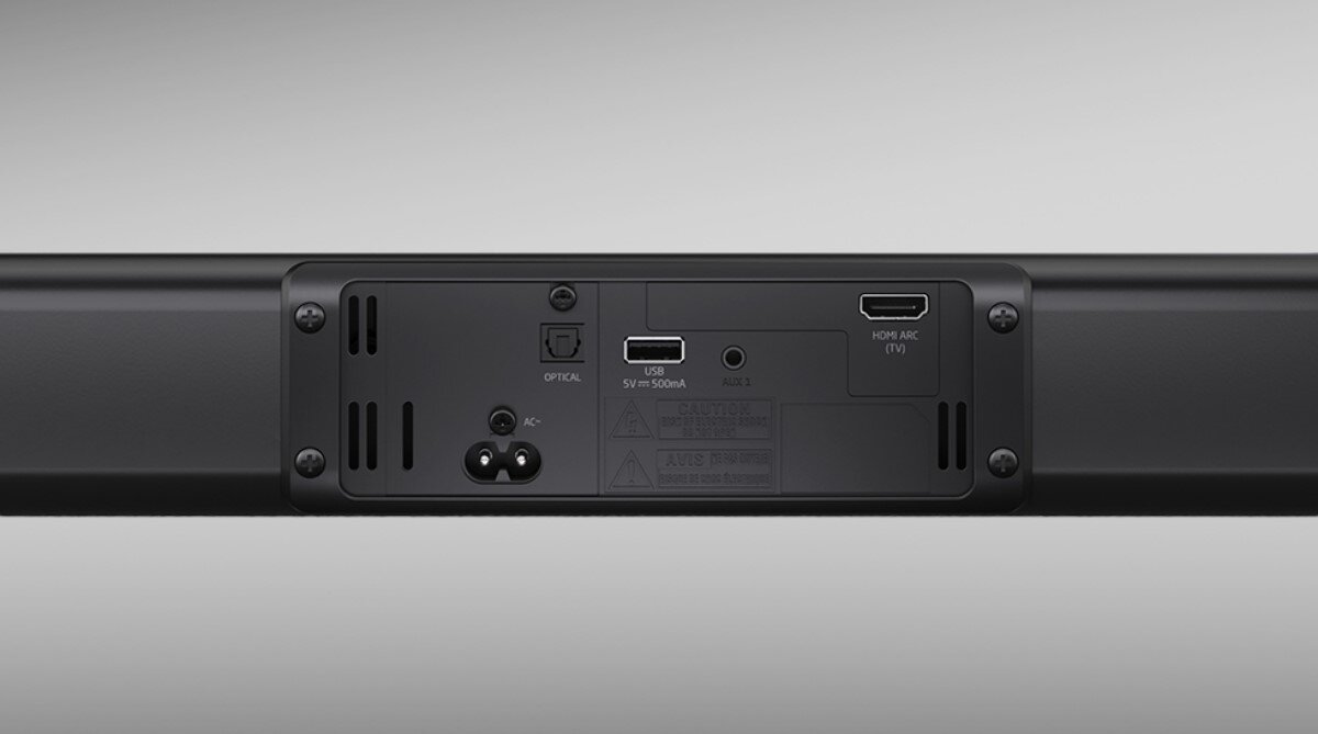 Tył soundbara z widocznymi portami: OPTICAL, USB 5V/500mA, HDMI ARC (TV) oraz gniazdem zasilania AC IN.