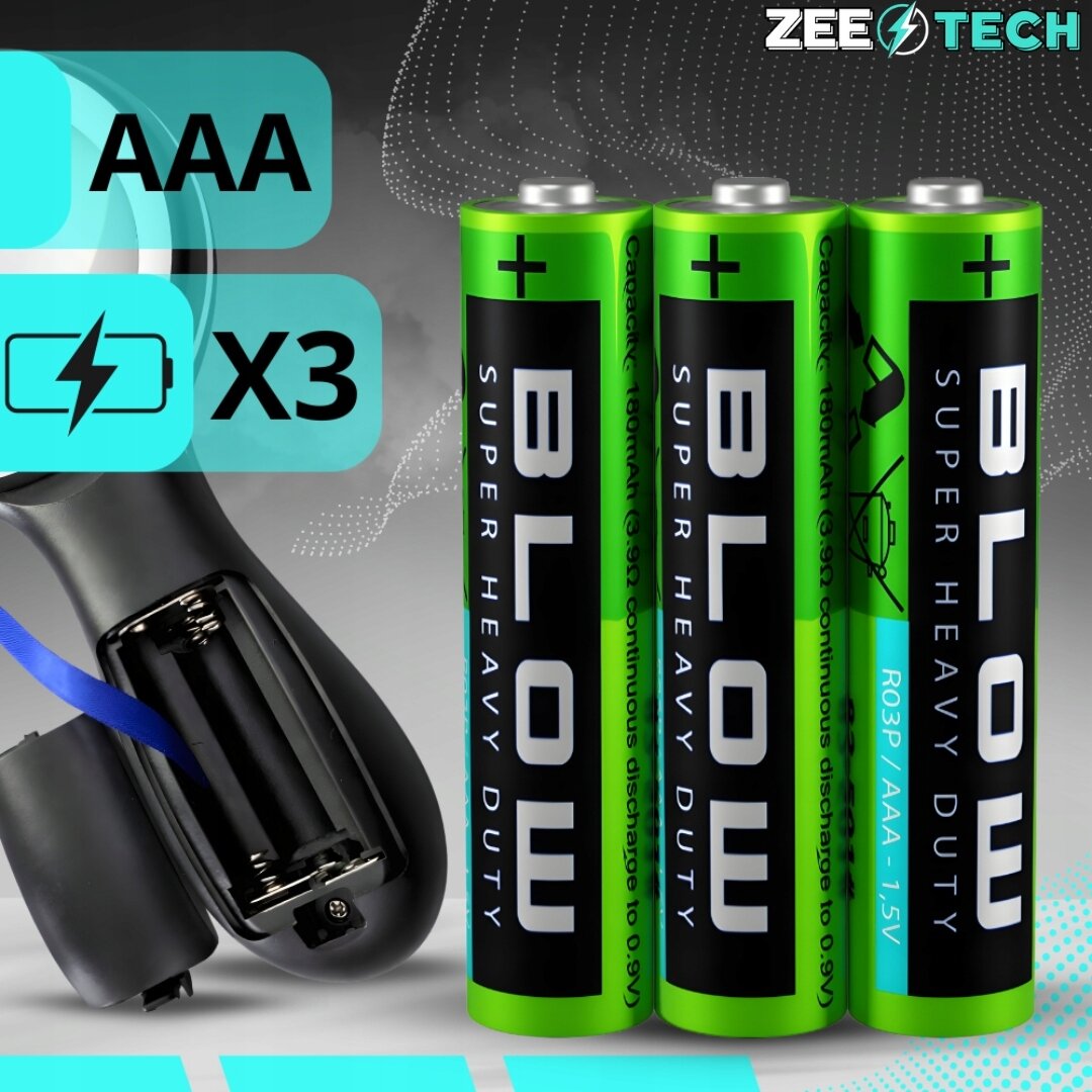 Obraz przedstawia trzy zielone baterie z napisem \'BLOW SUPER HEAVY DUTY\' oraz otwarty pojemnik na baterie. W tle widoczne są symbole \'AAA\' i \'X3\', a w prawym górnym rogu logo \'ZEETECH\'.