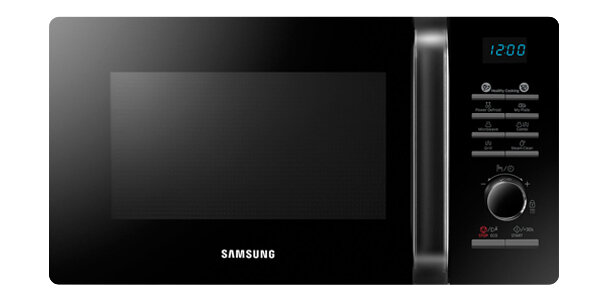 Kuchenka mikrofalowa w kolorze srebrnym z czarnym frontem, wyświetlaczem cyfrowym pokazującym \'12:00\' oraz przyciskami i pokrętłem do sterowania. Widoczne logo \'SAMSUNG\'.