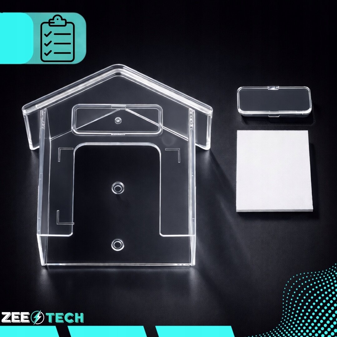 Przezroczysty daszek ochronny w kształcie domku, obok prostokątny element i kwadratowy kawałek materiału. Logo: ZEETECH.