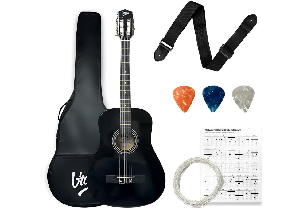 Na obrazie znajduje się czarna gitara klasyczna z logo \'V-TONE\' na główce, pokrowiec z napisem \'V-TONE\', pasek, trzy kostki gitarowe w różnych kolorach, zestaw strun oraz kartka z nutami zatytułowana \'Najważniejsze akordy gitarowe\'.