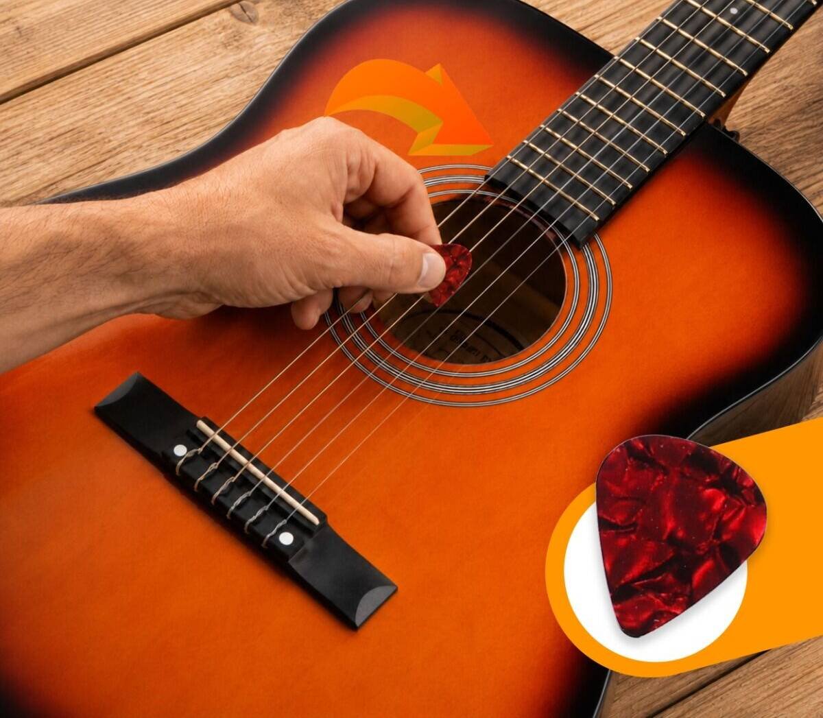 Osoba trzymająca czerwoną kostkę do gry na gitarze klasycznej o brązowym wykończeniu. Obok widoczna jest dodatkowa kostka na pomarańczowym tle.
