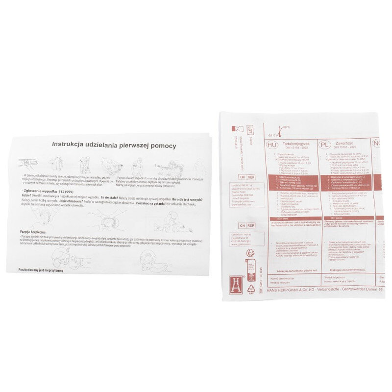 Dwa arkusze papieru z instrukcjami pierwszej pomocy i zawartością apteczki. Na lewym arkuszu widoczny jest tekst \'Instrukcja udzielania pierwszej pomocy\'.
