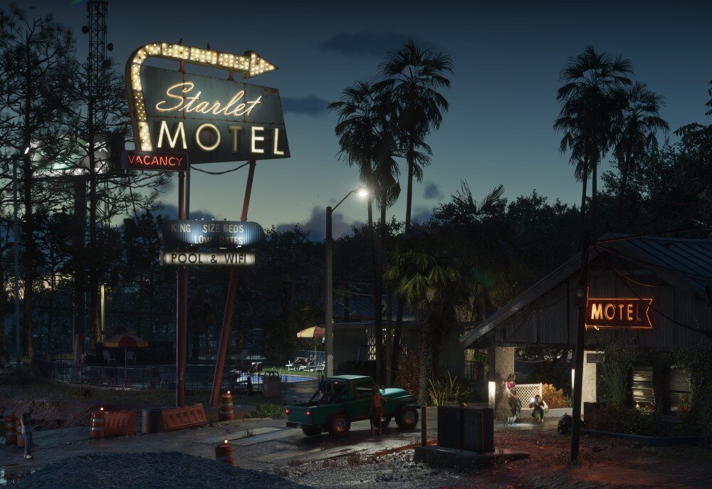 Grand Theft Auto VI Samochód terenowy stoi przed parterowym budynkiem z dużym, świecącym szyldem retro 'Starlet MOTEL' w otoczeniu palm po zmroku