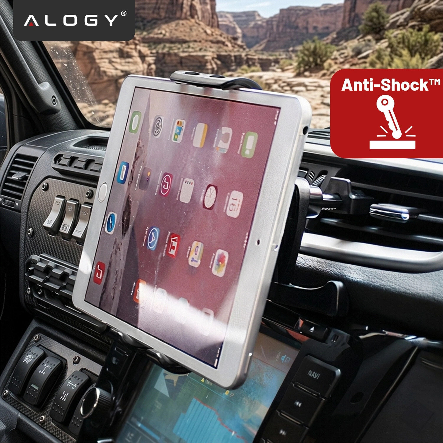 Tablet zamocowany w czarnym uchwycie samochodowym na kratce wentylacyjnej. Widoczne logo \'ALOGY\' oraz napis \'Anti-Shock™\'.