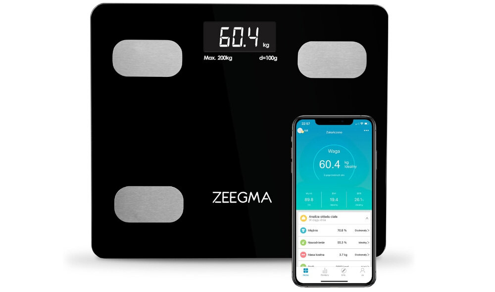Czarna waga łazienkowa z wyświetlaczem pokazującym \'60.4 kg\', z logo \'ZEEGMA\' poniżej. Obok wagi znajduje się smartfon z aplikacją pokazującą wyniki pomiarów.