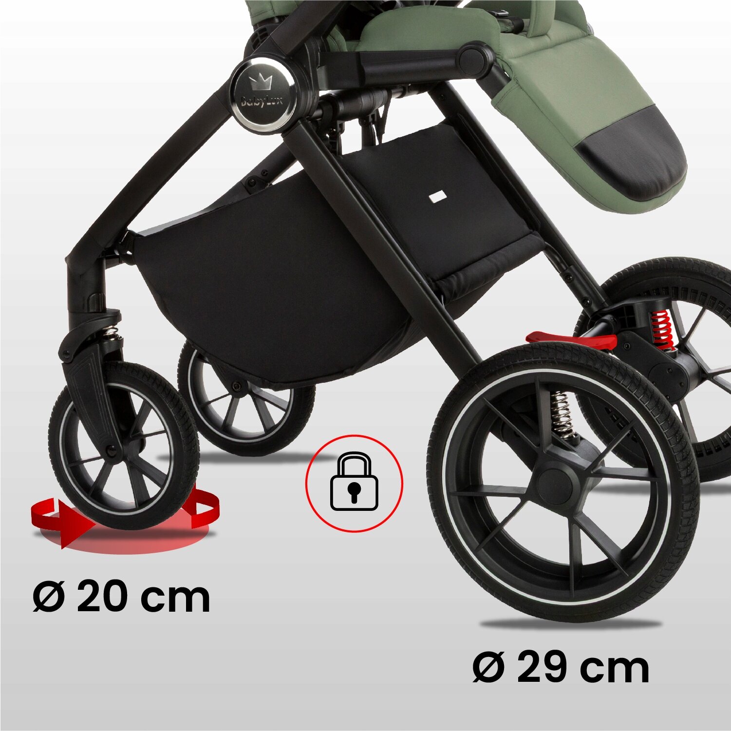 Obraz przedstawia dolną część wózka dziecięcego z widocznymi kołami o średnicy 20 cm i 29 cm. Na wózku znajduje się logo producenta oraz ikona kłódki w czerwonym okręgu.
