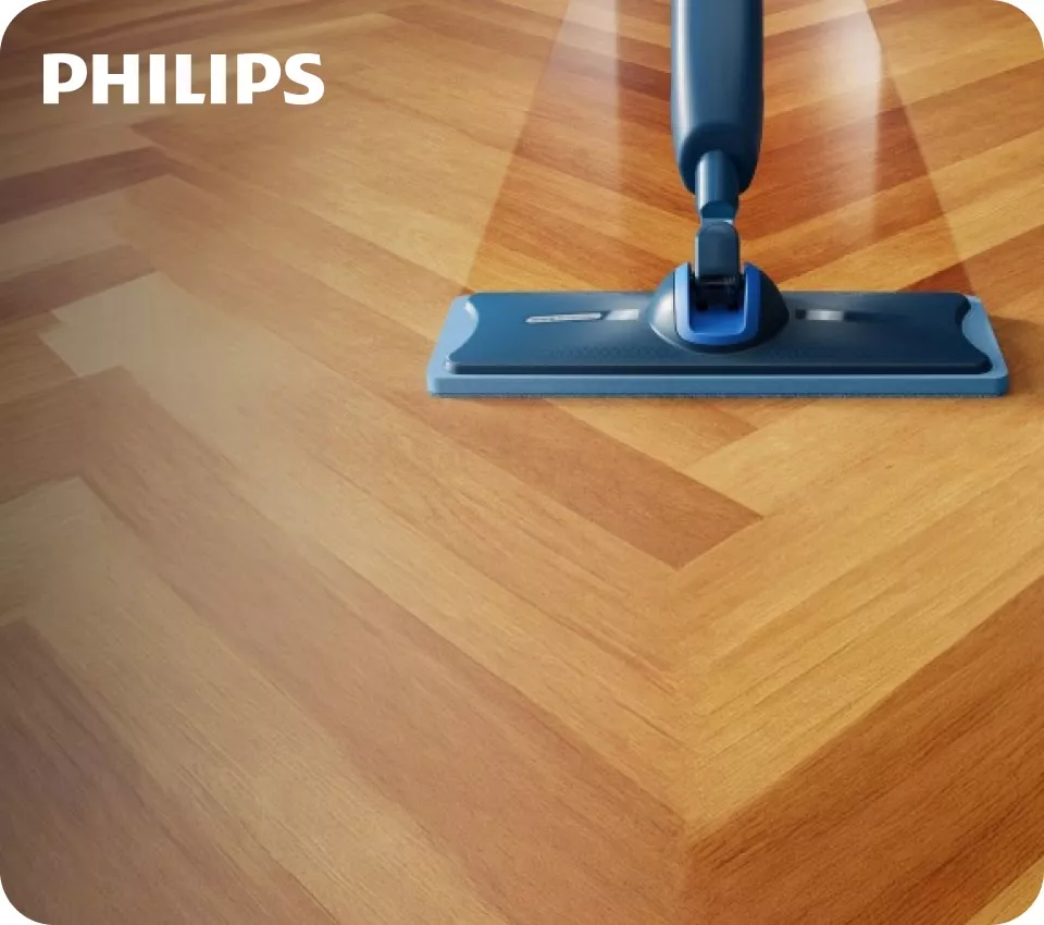 Philips OneUp myje drewnianą podłogę.