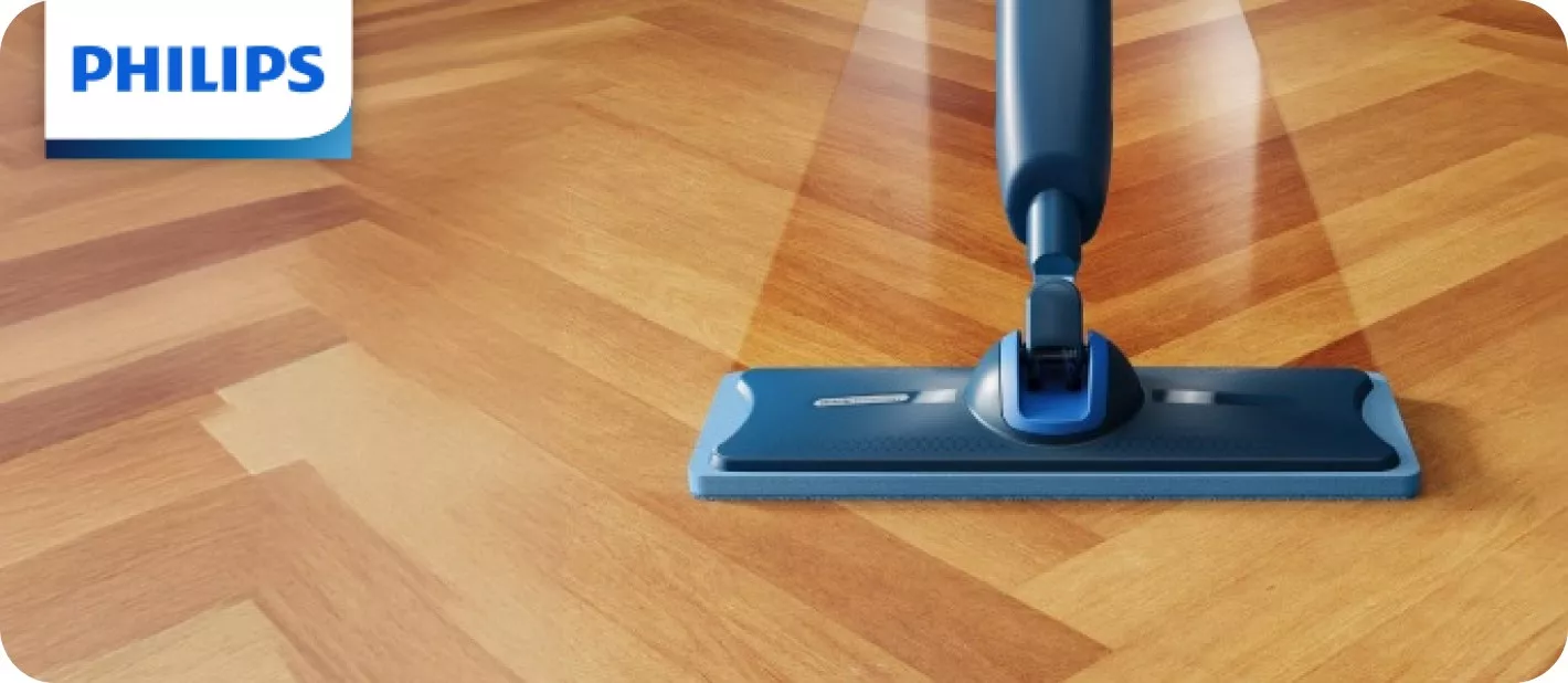 Philips OneUp myje drewnianą podłogę.