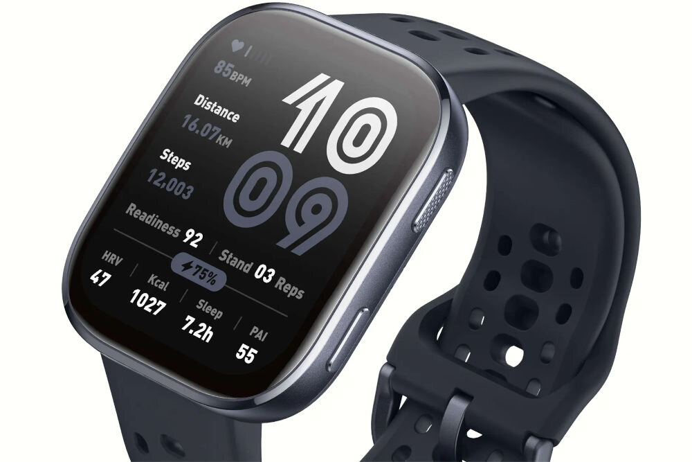 Czarny smartwatch z wyświetlaczem pokazującym czas 10:09 oraz dane takie jak tętno 85 BPM, dystans 16.07 KM, kroki 12,003, gotowość 92, stan 03 powtórzenia, HRV 47, kalorie 1027, sen 7.2h, PAI 55. Pasek zegarka ma perforacje i jest wykonany z ciemnego materiału.