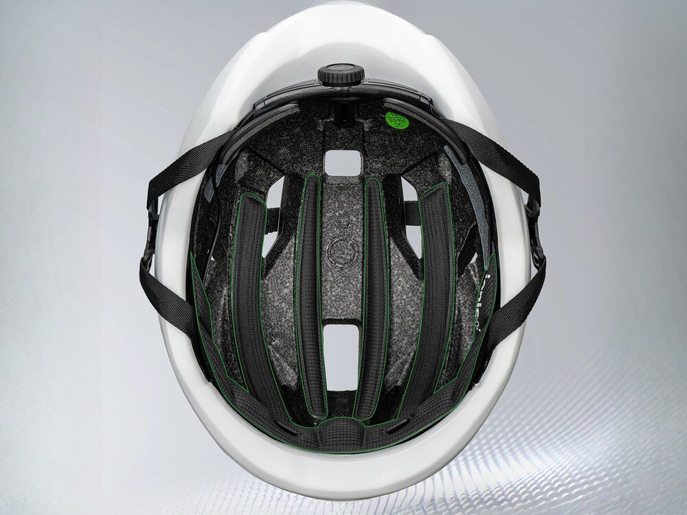 Biały kask rowerowy Rockbros LK-15 z logo marki, widok z boku pod kątem na białym tle z różowym akcentem z tyłu.