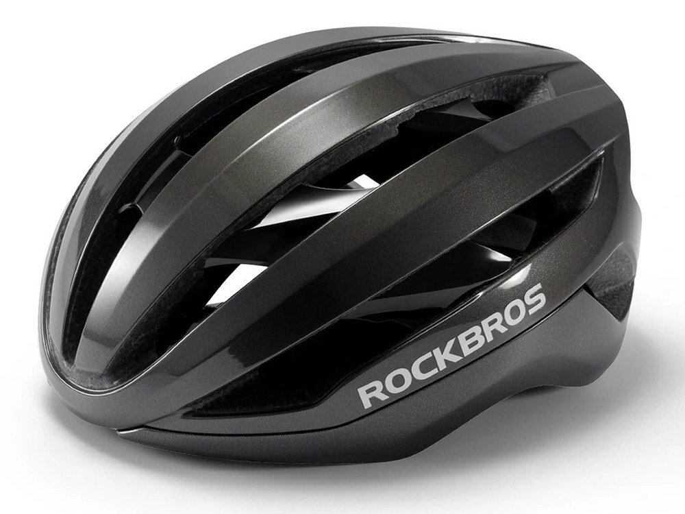 Szary kask rowerowy z otworami wentylacyjnymi i napisem \'ROCKBROS\' na boku.