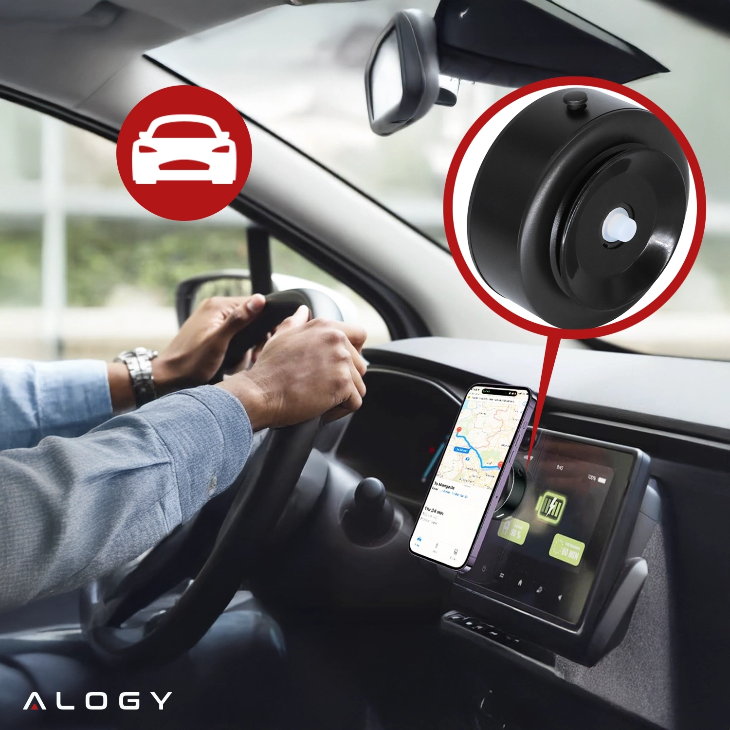 Wnętrze samochodu z zamontowanym uchwytem magnetycznym na telefon, który trzyma smartfon z wyświetloną mapą. Logo \'ALOGY\' widoczne w lewym dolnym rogu.