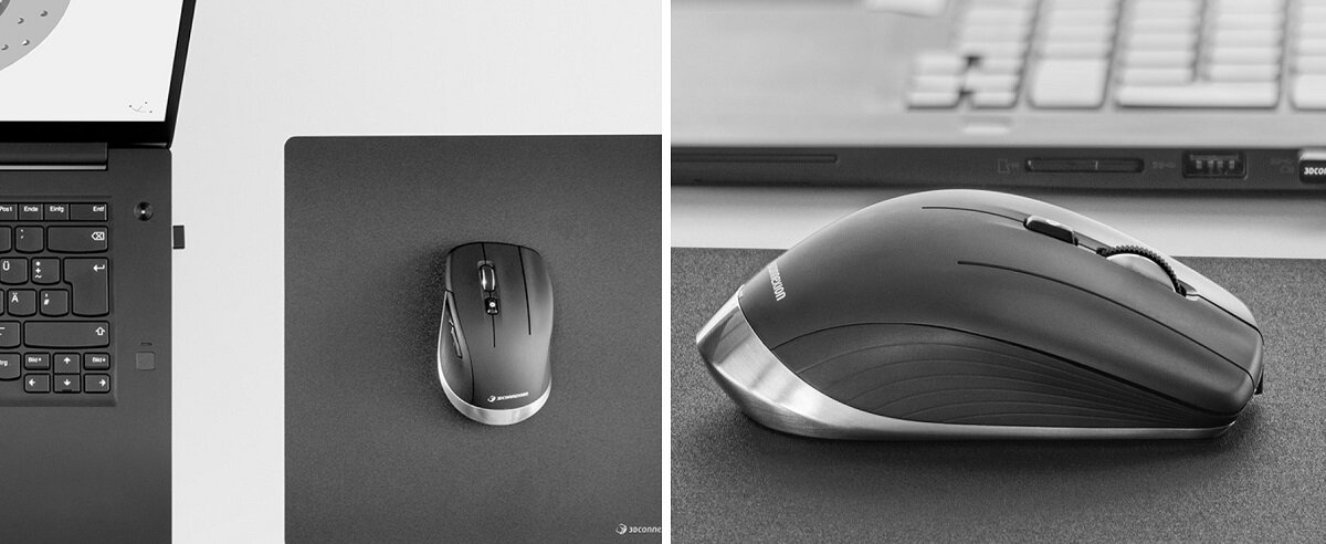 Na obrazie widoczna jest czarna mysz komputerowa z logo \'3Dconnexion\', umieszczona na ciemnej podkładce obok klawiatury laptopa. Mysz ma elegancki, opływowy kształt z metalicznymi akcentami.