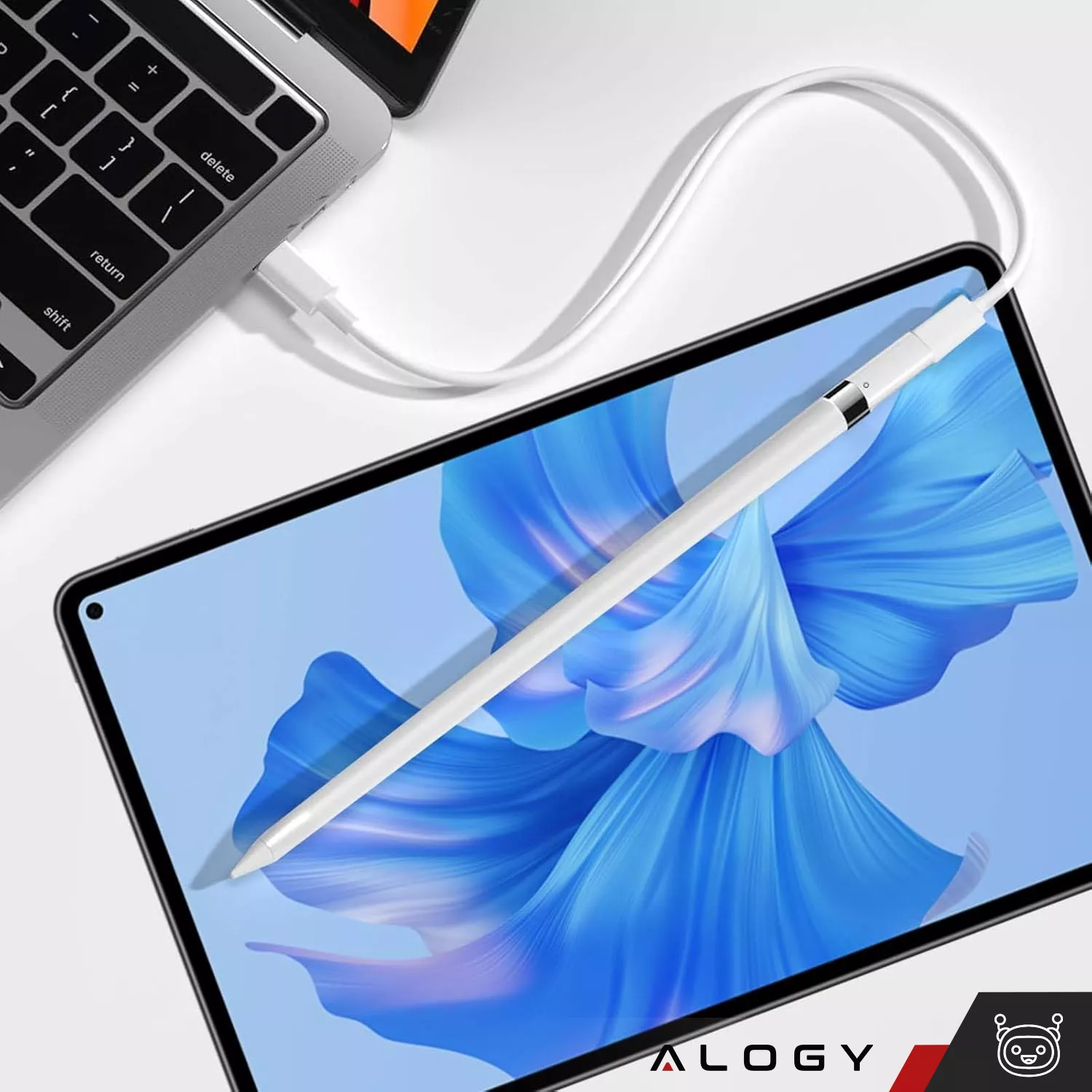 Na obrazie widać tablet z wyświetlaczem przedstawiającym niebieski wzór oraz biały rysik połączony kablem do laptopa. W prawym dolnym rogu znajduje się logo \'ALOGY\'.