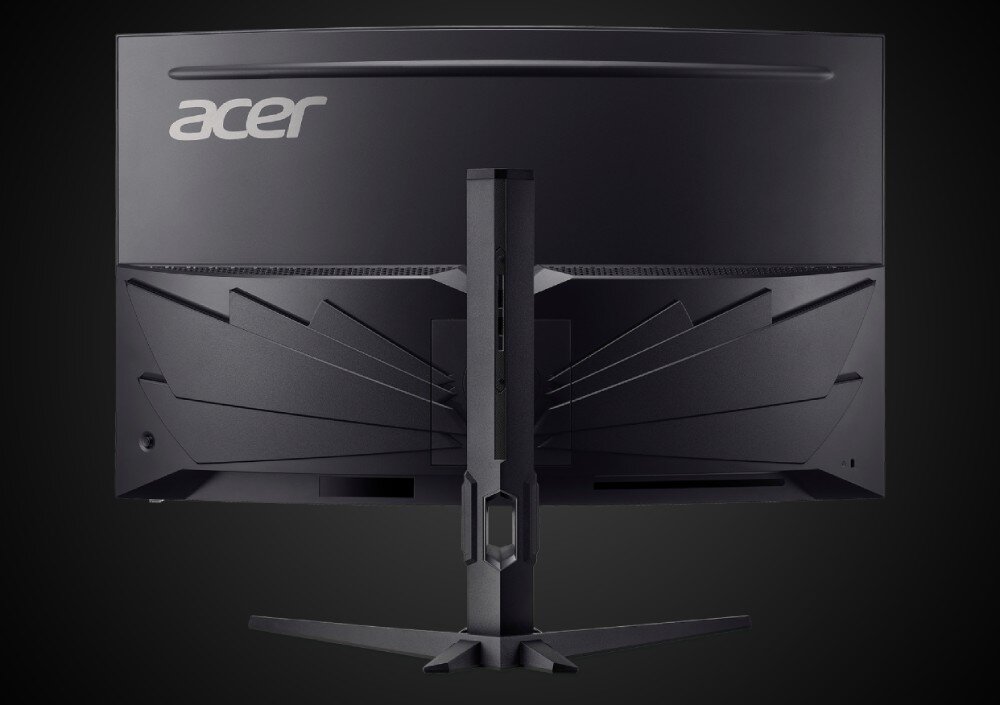 Monitor z zakrzywionym ekranem widziany od tyłu, z logo \'acer\' na górze. Posiada solidną podstawę i nowoczesny design z geometrycznymi wzorami.