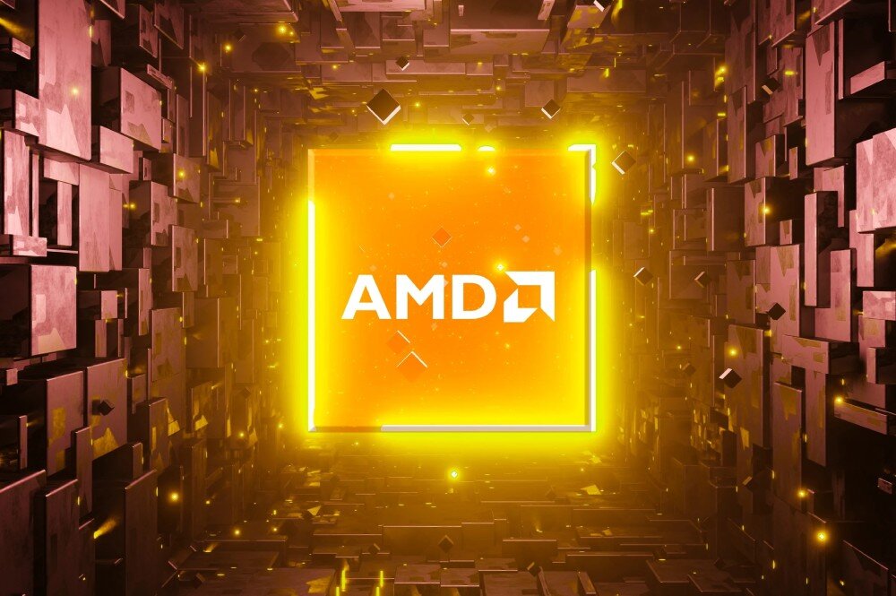 Komputer ACER Nitro N30-100 Jasny kwadrat z napisem 'AMD' umieszczony na tle trójwymiarowej, geometrycznej struktury z bloków