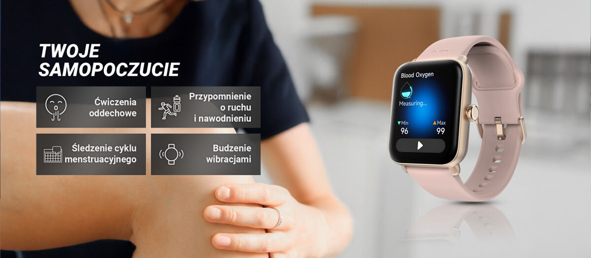 Na obrazie widoczny jest smartwatch z różowym paskiem, wyświetlający ekran z pomiarem tlenu we krwi. Obok znajdują się ikony z napisami: \'Ćwiczenia oddechowe\', \'Przypomnienie o ruchu i nawodnieniu\', \'Śledzenie cyklu menstruacyjnego\', \'Budzenie wibracjami\'.