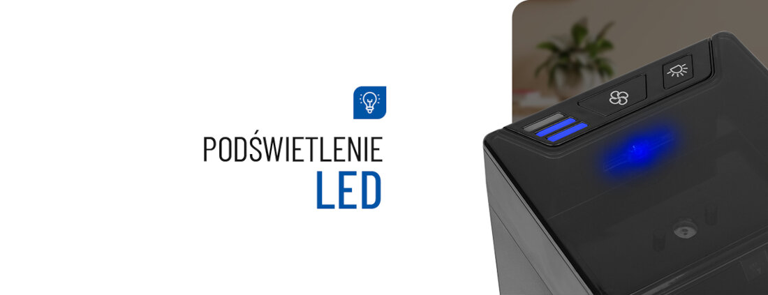Obraz przedstawia fragment urządzenia z podświetleniem LED oraz przyciskami z symbolami wentylatora i światła. Obok widnieje napis \'PODŚWIETLENIE LED\' z ikoną żarówki.