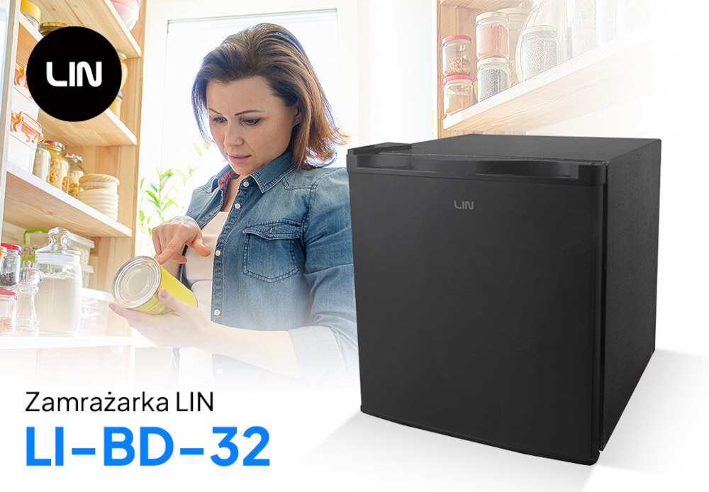 Obraz przedstawia czarną zamrażarkę z logo LIN oraz kobietę trzymającą puszkę w kuchni. Na dole widoczny jest napis: \'Zamrażarka LIN LI-BD-32\'.