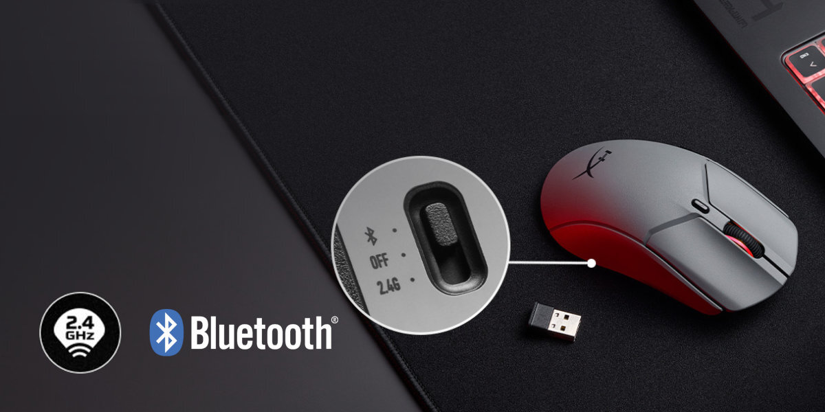 Na obrazie widoczna jest szara mysz komputerowa z logo producenta oraz mały adapter USB. Obok znajduje się powiększenie przełącznika z opcjami \'Bluetooth\', \'OFF\', \'2.4G\' oraz ikony \'2.4 GHz\' i \'Bluetooth\'.