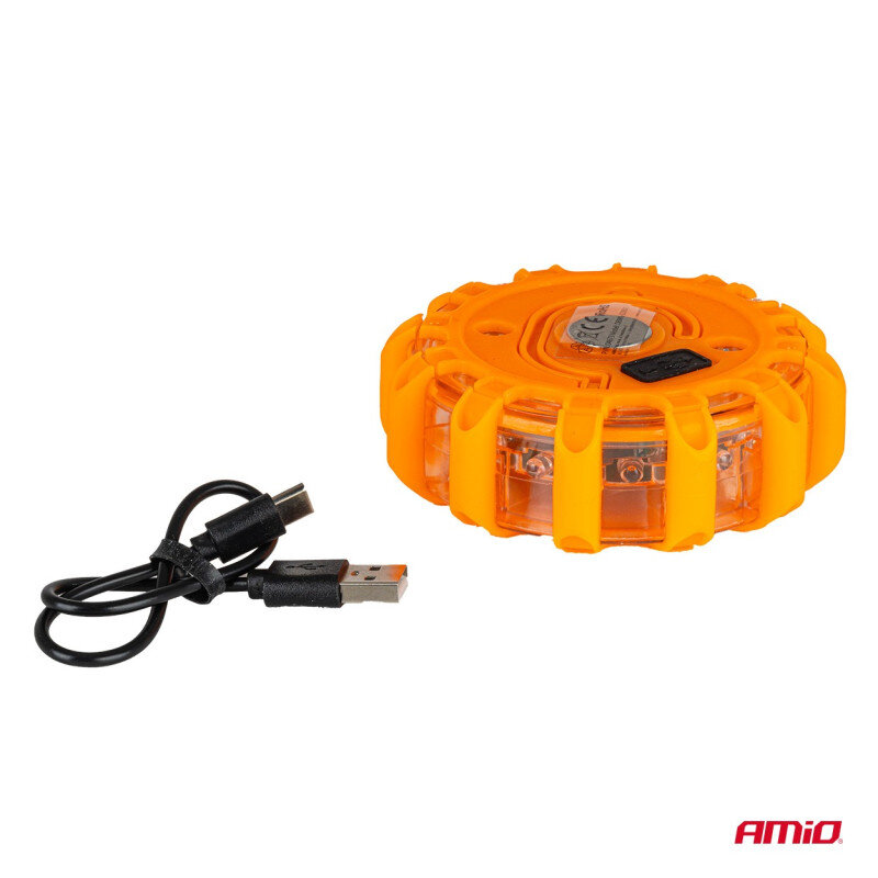 Na obrazie widoczna jest pomarańczowa lampa ostrzegawcza z przezroczystymi elementami oraz czarny kabel USB. W prawym dolnym rogu znajduje się logo \'AMiO\'.