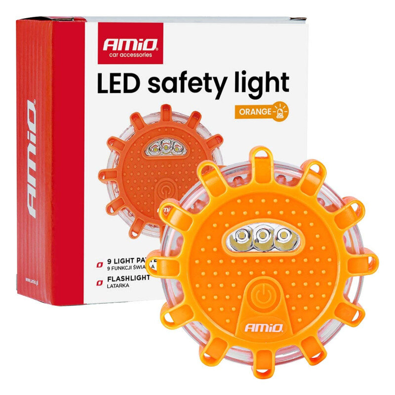 Na obrazie widoczna jest pomarańczowa lampa ostrzegawcza z trzema diodami LED, umieszczona przed opakowaniem z napisem \'AMiO car accessories LED safety light ORANGE\'.