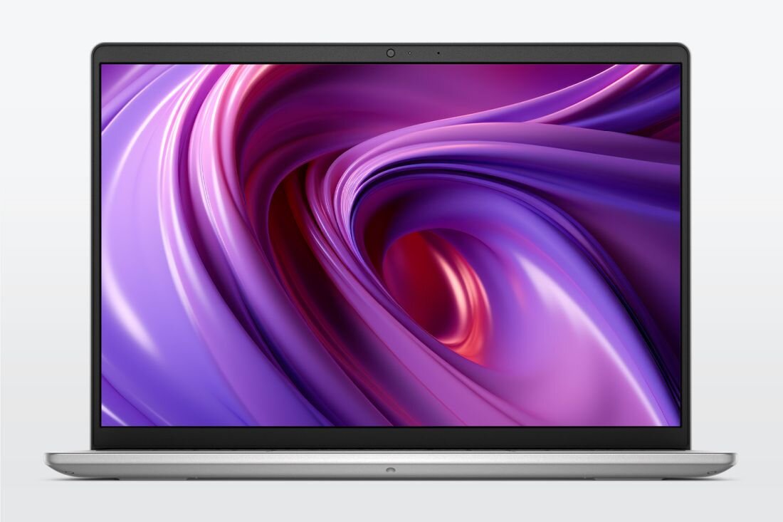 Laptop z wyświetlaczem pokazującym abstrakcyjną grafikę w odcieniach fioletu i różu. Obudowa jest srebrna, a ekran otoczony cienką ramką.