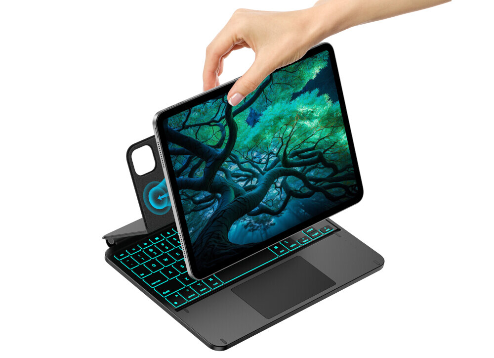 Na obrazie widoczny jest tablet z wyświetlonym obrazem drzewa, umieszczony w czarnym etui z klawiaturą. Klawiatura ma podświetlenie w kolorze zielonym, a obok znajduje się logo w kształcie litery G.