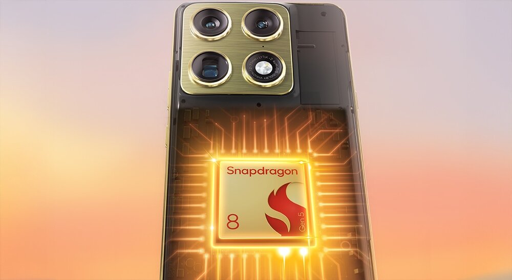 Obraz przedstawia tył smartfona z trzema dużymi obiektywami aparatu oraz widocznym logo \'Snapdragon 8 Gen 5\'.