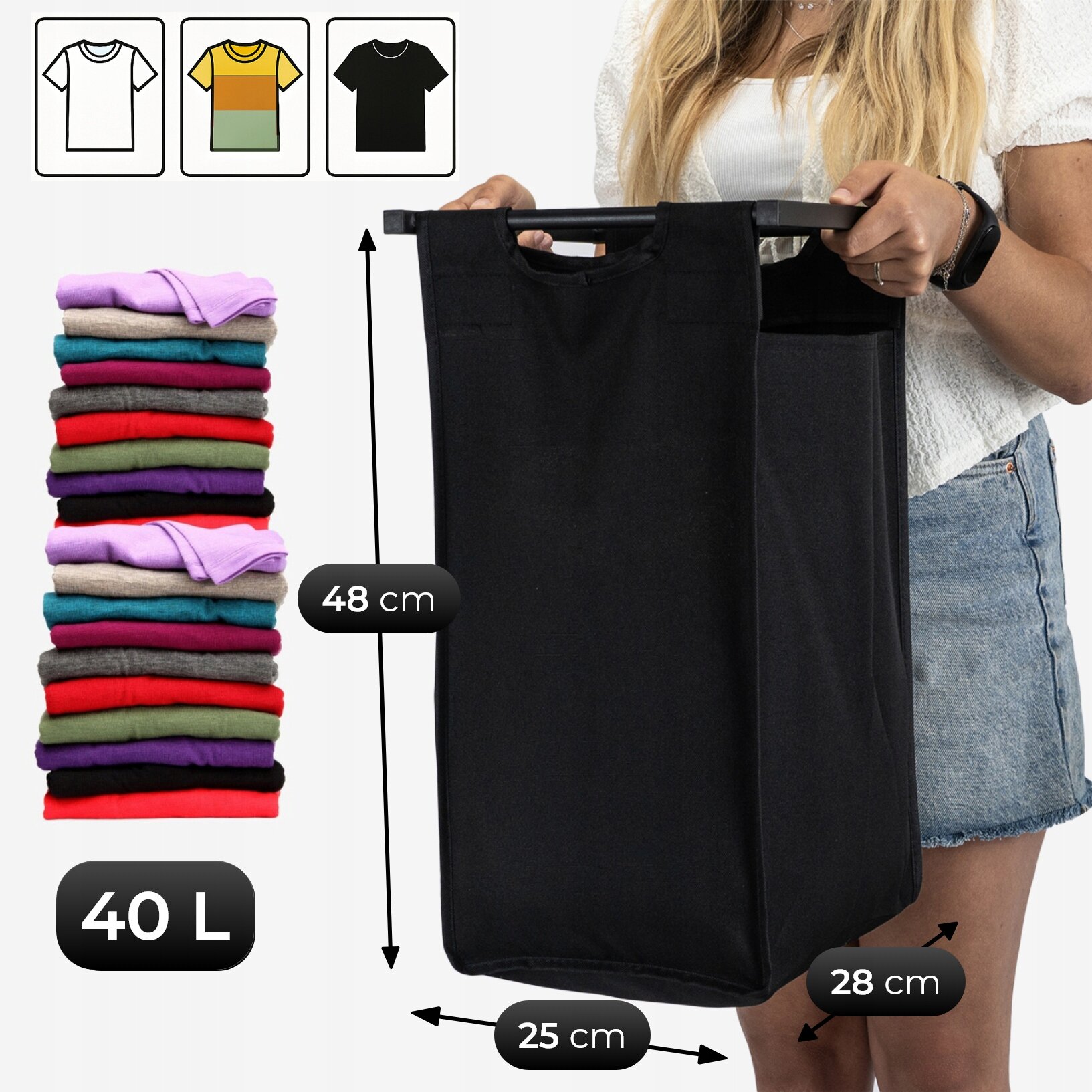 Osoba trzyma czarny kosz na pranie o wymiarach 48 cm wysokości, 25 cm szerokości i 28 cm głębokości. Obok znajduje się stos kolorowych ubrań z oznaczeniem pojemności 40 L.