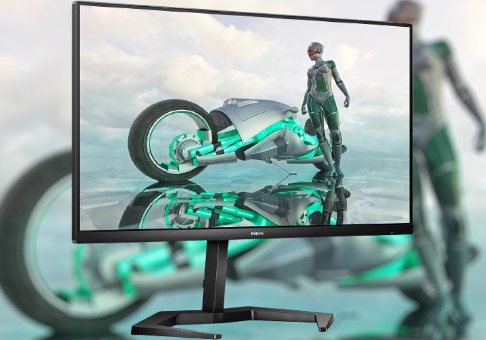 Monitor wyświetla grafikę przedstawiającą futurystyczny motocykl i postać w kombinezonie. Na ramce monitora widoczne jest logo \'PHILIPS\'.