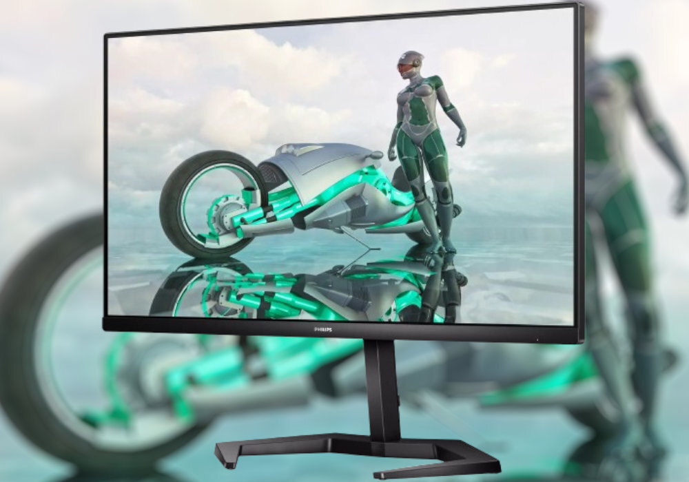 Monitor wyświetla obraz futurystycznego motocykla i postaci w zbroi na tle nieba. Na ramce monitora widoczne jest logo \'PHILIPS\'.