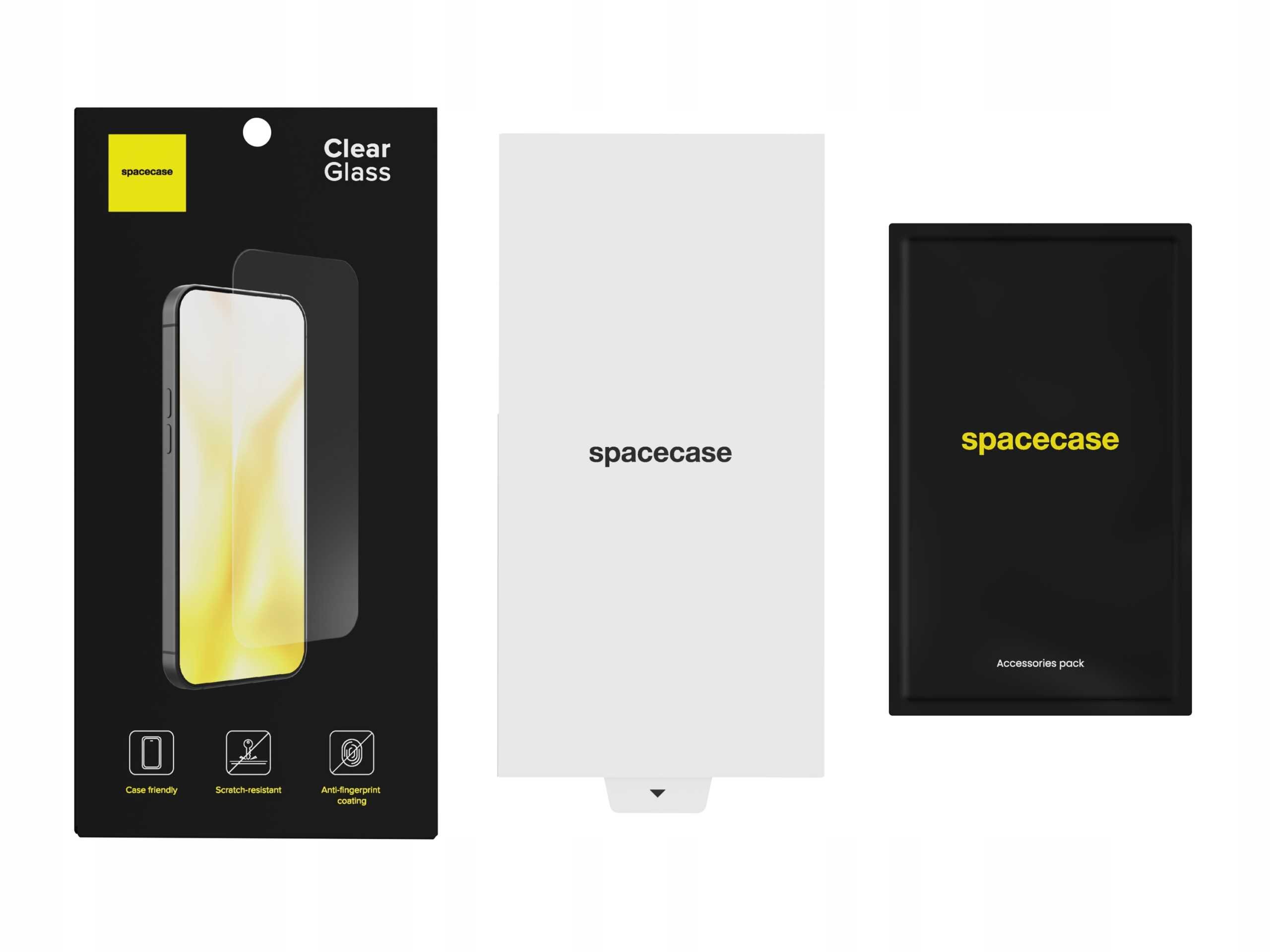 Na obrazie widoczne są trzy elementy: opakowanie szkła hartowanego z napisem \'spacecase Clear Glass\', białe pudełko z napisem \'spacecase\' oraz czarne pudełko z napisem \'spacecase Accessory pack\'.