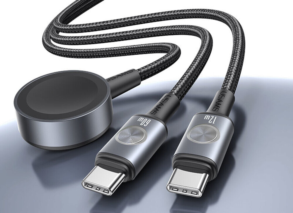 Na obrazie widoczna jest czarna ładowarka z trzema końcówkami, w tym dwoma złącza USB-C oznaczonymi jako 60W i 12W oraz okrągłą końcówką. Na kablu widnieje napis \'USAMS\'.