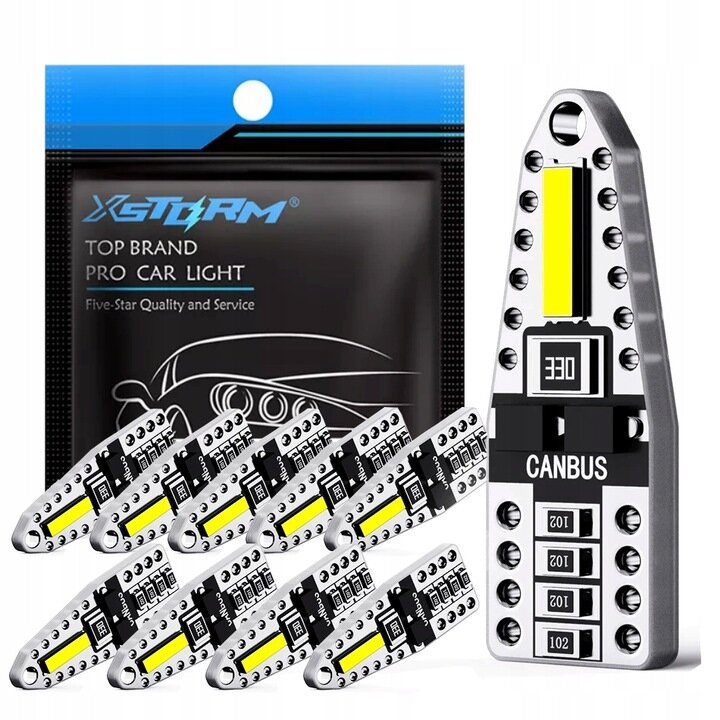Obraz przedstawia zestaw żarówek LED z napisem \'CANBUS\' oraz opakowanie z logo \'XSTORM\' i tekstem \'TOP BRAND PRO CAR LIGHT Five-Star Quality and Service\'. Żarówki mają srebrny kolor z żółtym elementem świetlnym i są pokazane w ilości dziesięciu sztuk.